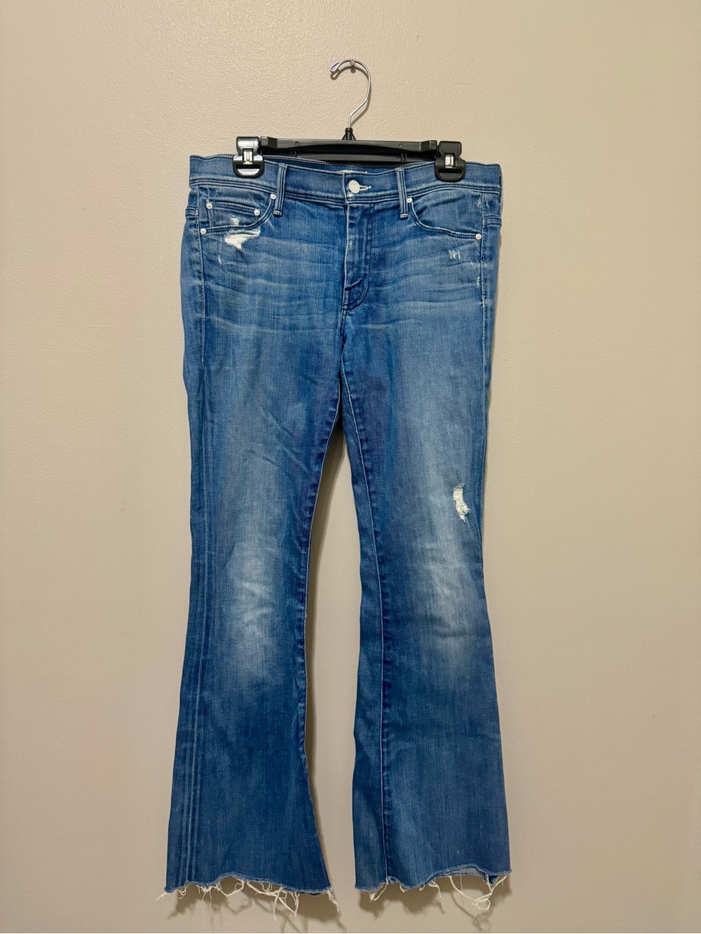 MOTHER Blue Distressed Flare Jeans with Raw Hem